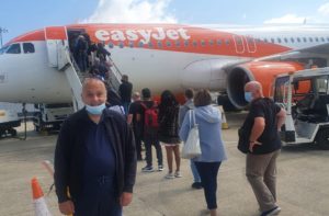 Nick prepares to board the plane