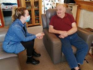 Claire with Mike, a person we support