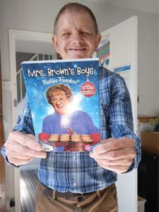 Terry with a Mrs Brown's Boys DVD