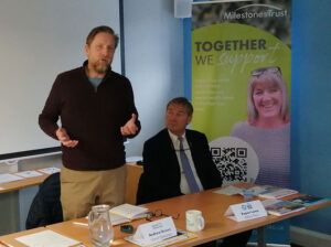 A photo of Andrew Brown, The Liberal Democrats' parliamentary candidate for Kingswood talking with people supported by Milestones Trust.