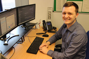 A man sitting at a desk