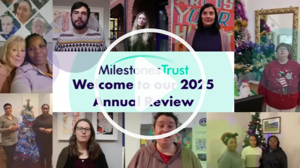 A screenshot or still from our Annual Review video with a play button over the top.